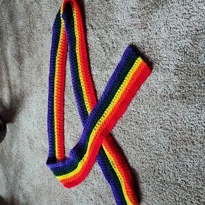 Beautiful homemade knitted rainbow scarf.